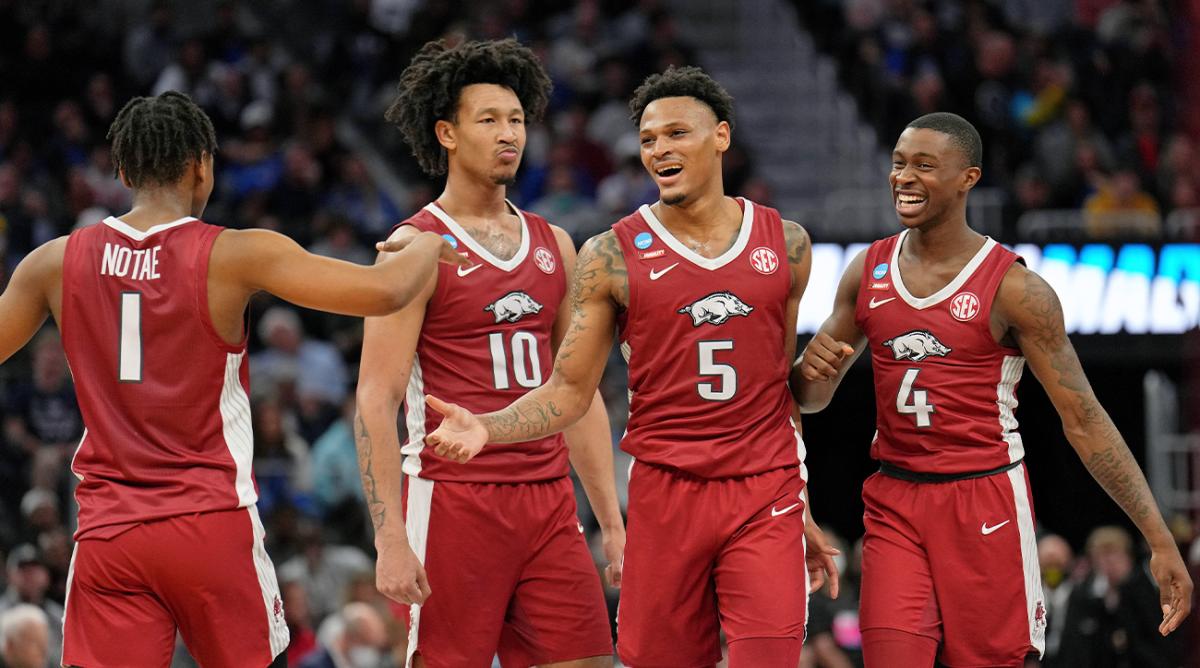 Mar 24, 2022; San Francisco, CA, USA; Arkansas Razorbacks guard JD Notae (1) and forward Jaylin Williams (10) and guard Au’Diese Toney (5) and guard Davonte Davis (4) react after a play against the Gonzaga Bulldogs during the second half in the semifinals of the West regional of the men’s college basketball NCAA Tournament at Chase Center. The Arkansas Razorbacks won 74-68.