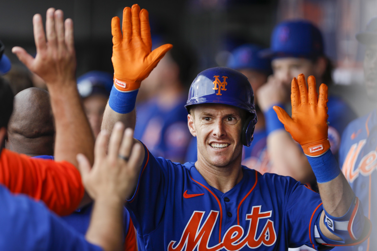 Mar 24, 2022; Port St. Lucie, Florida, USA; New York Mets right fielder Mark Canha (19) celebrates with teammates after hitting a home run in the first inning against the Miami Marlins during spring training at Clover Park. Mandatory Credit: Sam Navarro-USA TODAY Sports