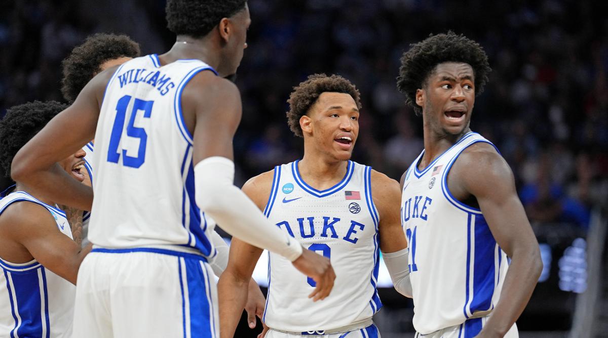 Mar 24, 2022; San Francisco, CA, USA; Duke Blue Devils forward Wendell Moore Jr. (center) and forward AJ Griffin (right) reacts after a play against the Texas Tech Red Raiders during the second half in the semifinals of the West regional of the men’s college basketball NCAA Tournament at Chase Center.