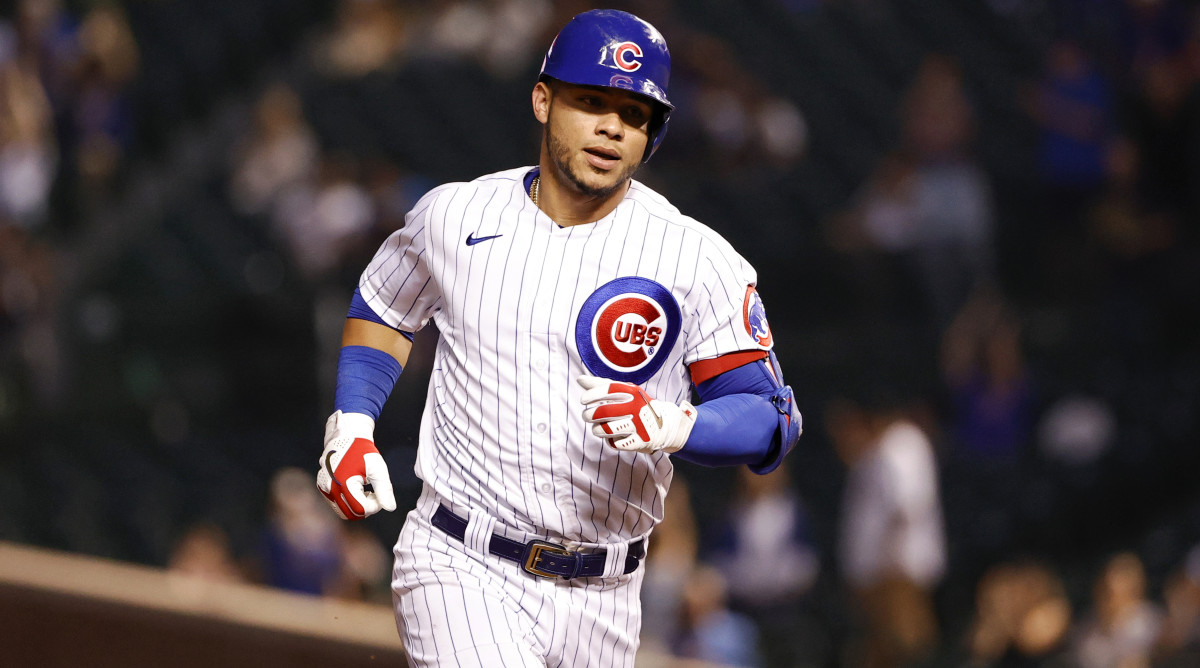 Sep 7, 2021; Chicago, Illinois, USA; Chicago Cubs catcher Willson Contreras (40) rounds the bases after hitting a solo home run against the Cincinnati Reds during the third inning at Wrigley Field.