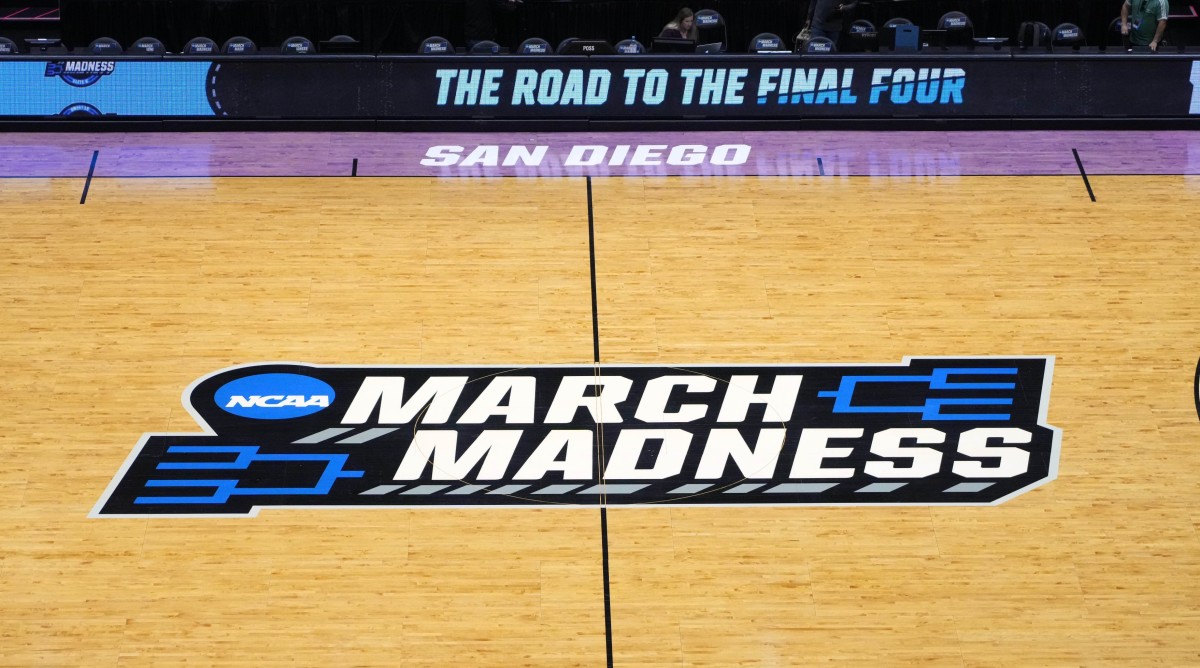 A “March Madness” logo on the court in San Diego.