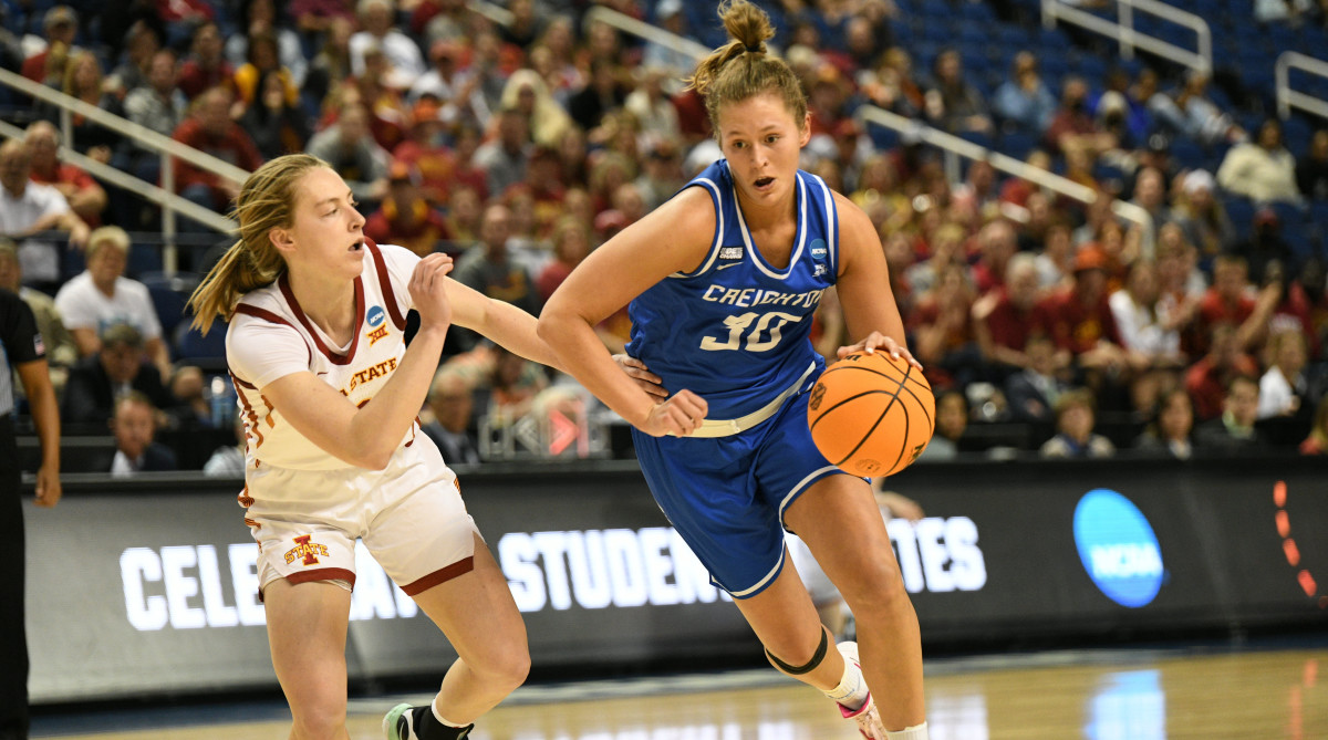Creighton Bluejays guard Morgan Maly (30) drives on Iowa State Cyclones guard Ashley Joens (24) in the third quarter in the Greensboro regional semifinals of the women’s college basketball NCAA Tournament at Greensboro Coliseum.