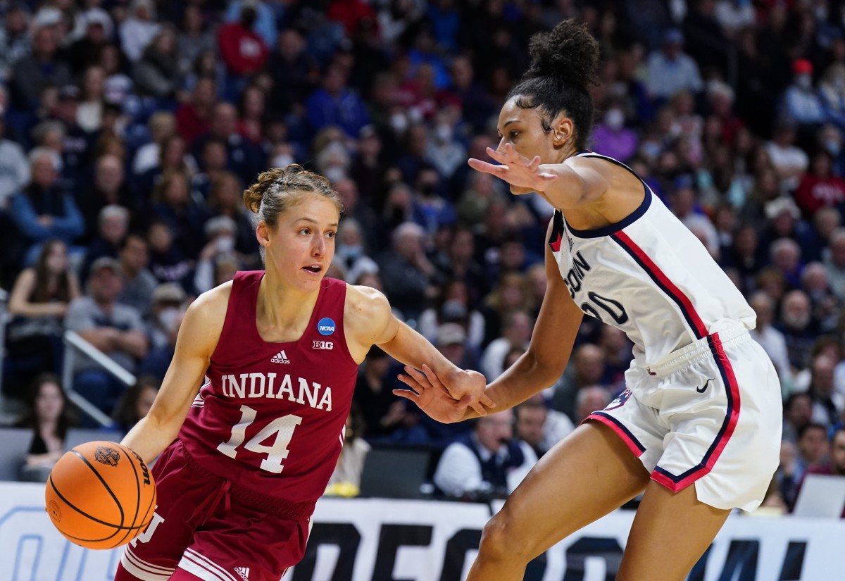 Indiana guard Ali Patberg drives past a Connecticut defender on Saturday. Patberg finished with a team-high 16 points in her final college game. (USA TODAY Sports)