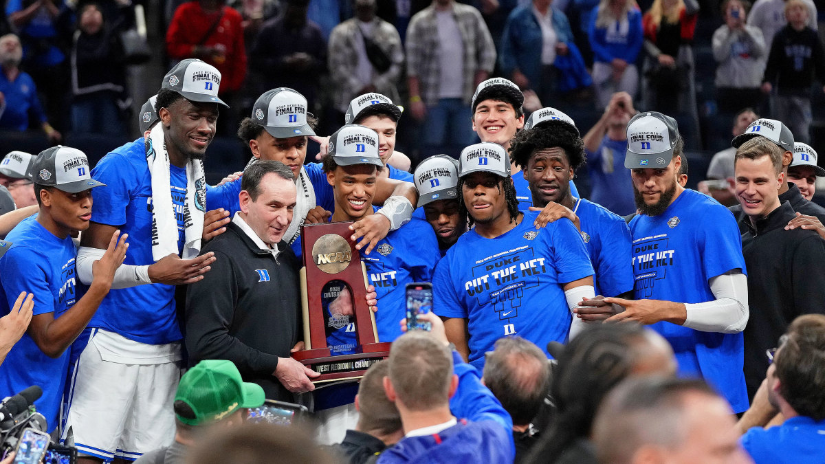 Coach K and his Duke team celebrate winning the West Region