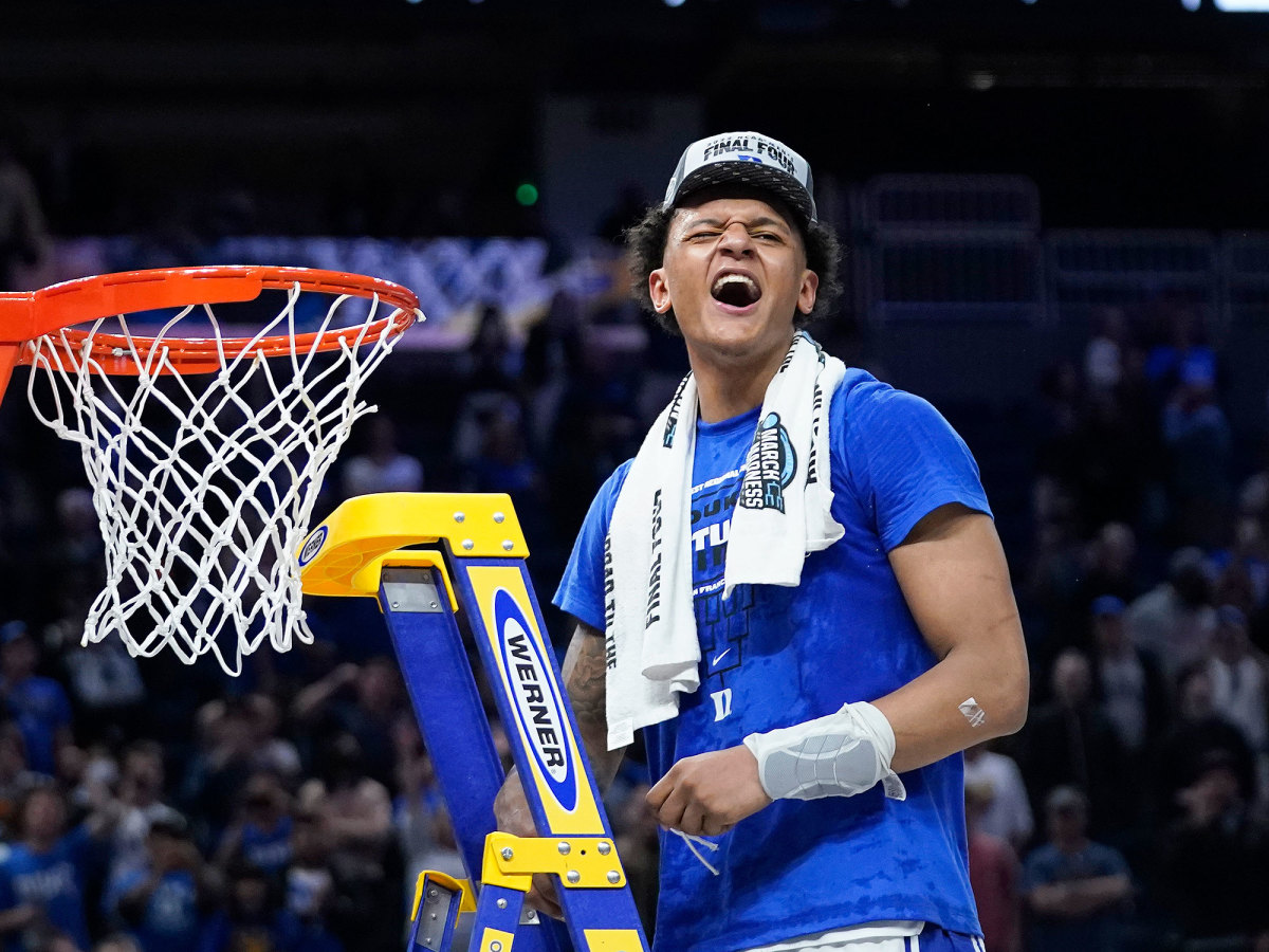 Duke’s Paolo Banchero cuts down the West regional final net