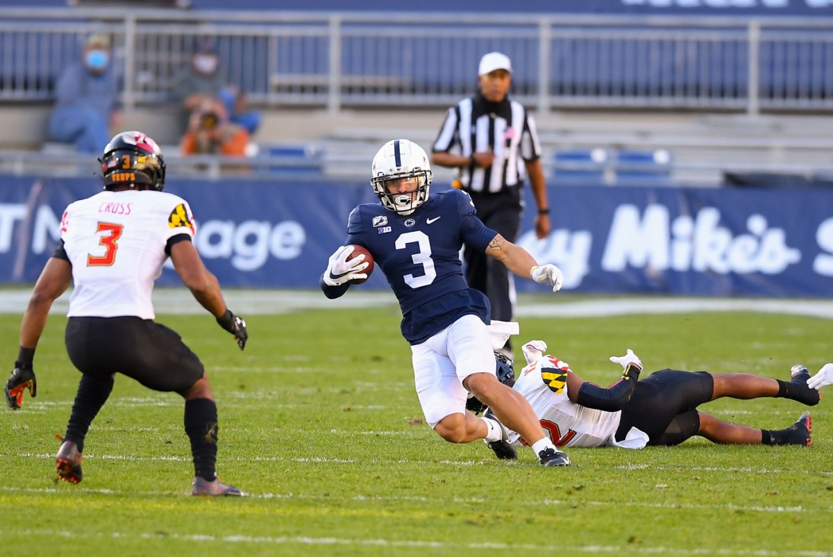 Nov 7, 2020; University Park, Pennsylvania, USA; Penn State Nittany Lions wide receiver Parker Washington (3) runs with the ball after a catch as Maryland Terrapins defensive back Nick Cross (3) defends during the first quarter at Beaver Stadium. Mandatory Credit: Rich Barnes-USA TODAY Sports