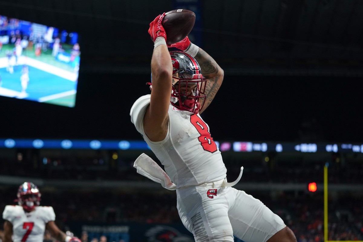 Dec 3, 2021; San Antonio, TX, USA; Western Kentucky Hilltoppers wide receiver Jerreth Sterns (8) catches a touchdown in the second half of the 2021 Conference USA Championship Game against the UTSA Roadrunners at the Alamodome. Mandatory Credit: Daniel Dunn-USA TODAY Sports