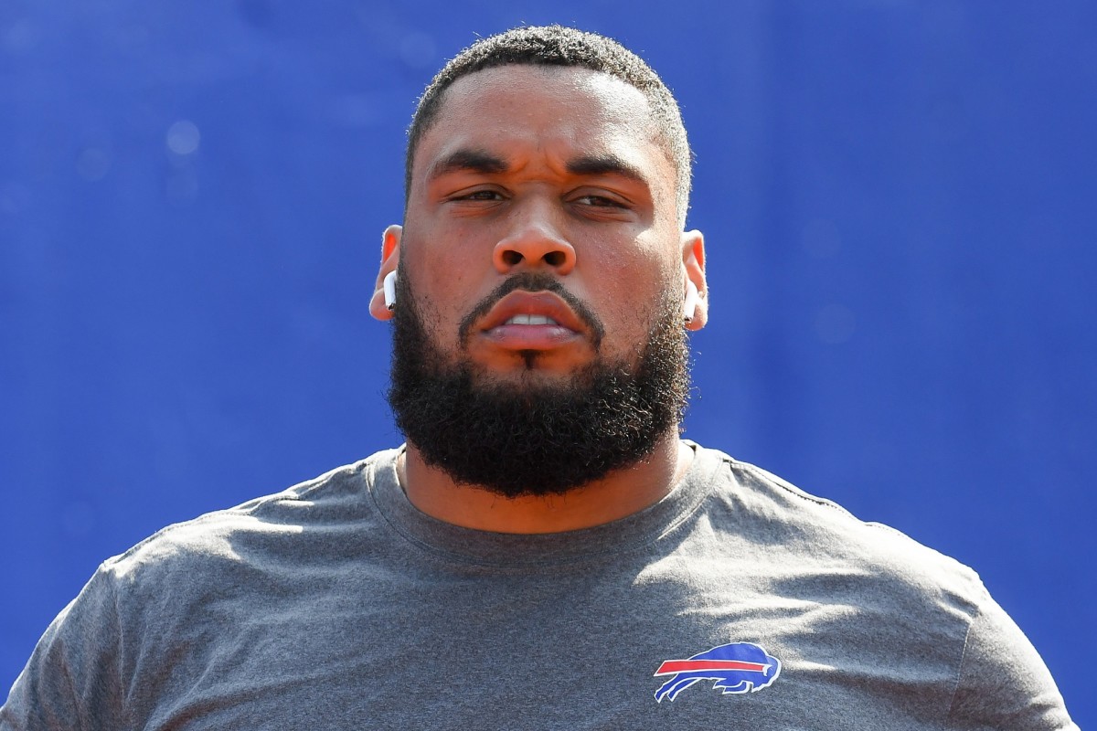 Aug 28, 2021; Orchard Park, New York, USA; Buffalo Bills offensive guard Jamil Douglas (77) walks to the field prior to the game against the Green Bay Packers at Highmark Stadium.