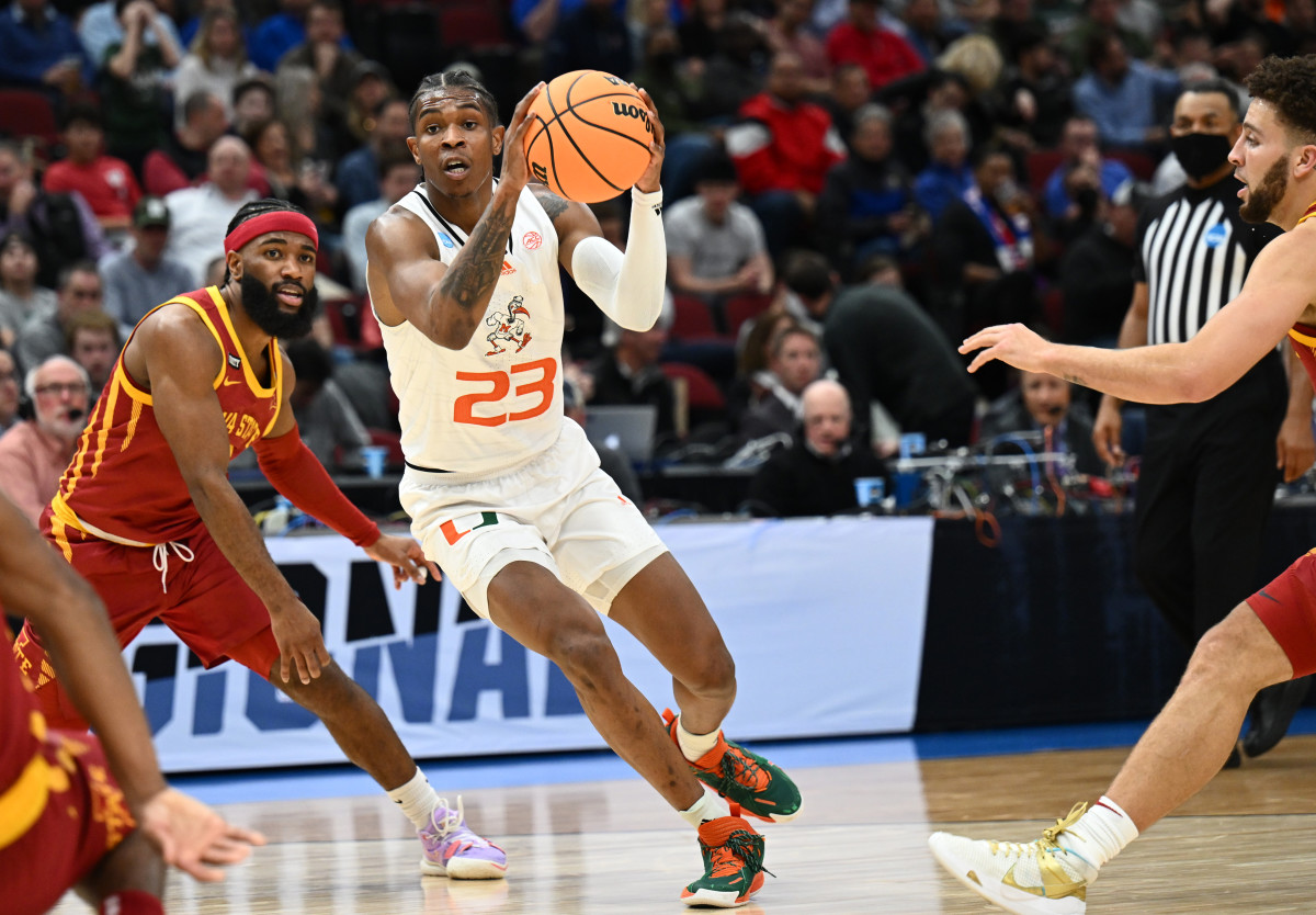 Mar 25, 2022; Chicago, IL, USA; Miami Hurricanes guard Kameron McGusty (23) drives during the first half against the Iowa State Cyclones in the semifinals of the Midwest regional of the men's college basketball NCAA Tournament at United Center. Mandatory Credit: Jamie Sabau-USA TODAY Sports