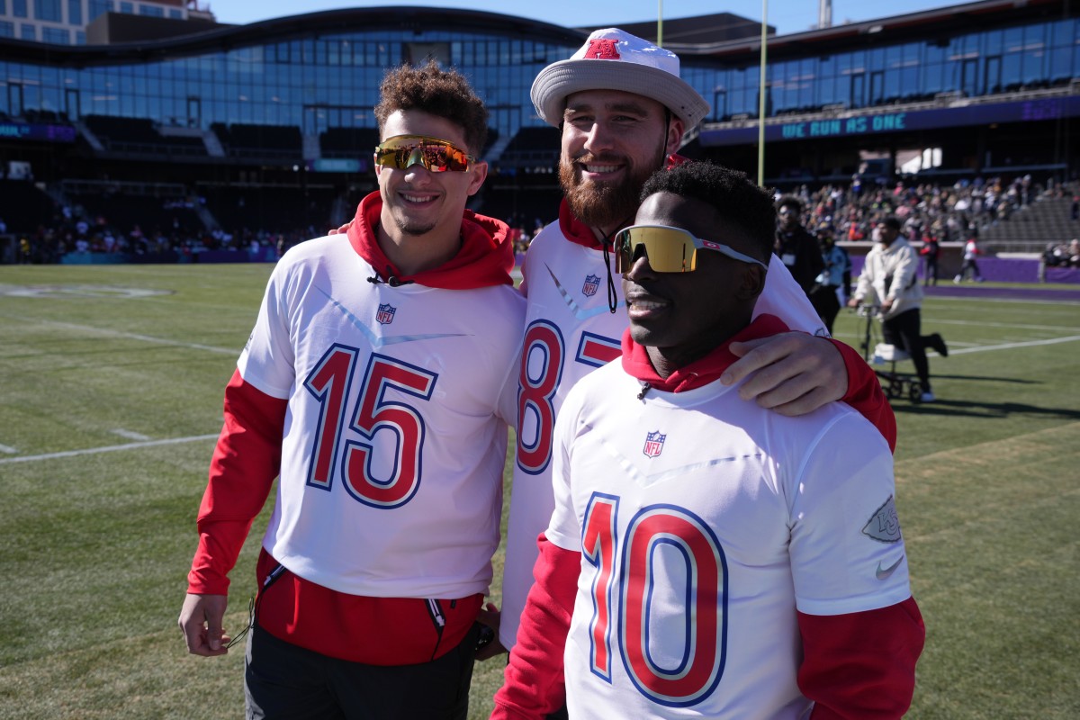 Feb 3, 2022; Las Vegas, NV, USA; Kansas City Chiefs quarterback Patrick Mahomes (15), tight end Travis Kelce (87) and receiver Tyreek Hill (10) pose Nduring AFC practice for the Pro Bowl at Las Vegas Ballpark. Mandatory Credit: Kirby Lee-USA TODAY Sports