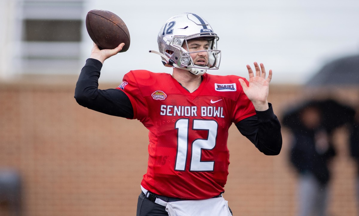 Feb 2, 2022; Mobile, AL, USA; National squad quarterback Carson Strong of Nevada (12) throws a pass during National team practice for the 2022 Senior Bowl at Hancock Whitney Stadium. Mandatory Credit: Vasha Hunt-USA TODAY Sports