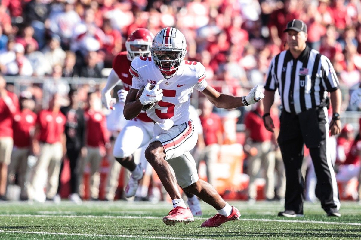 Ohio State WR Garrett Wilson jukes after catch