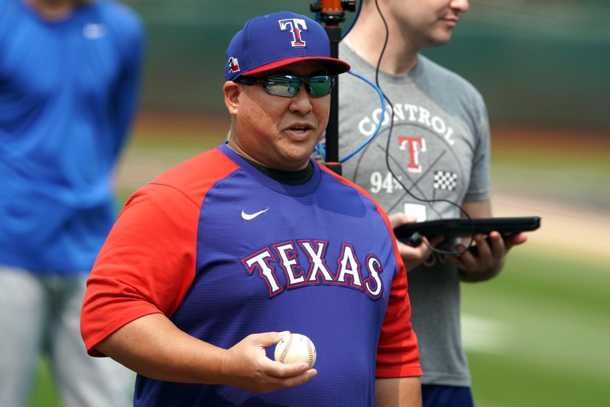 Aug 7, 2021; Oakland, California, USA; Texas Rangers pitching coach Brendan Sagara (85) stands on the field before the game against the Oakland Athletics at RingCentral Coliseum. Mandatory Credit: Darren Yamashita-USA TODAY Sports