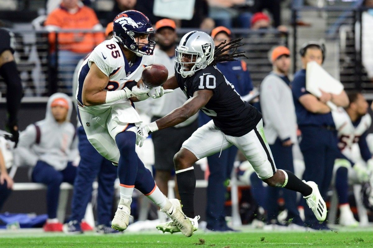 Las Vegas Raiders cornerback Desmond Trufant (10) defends a pass to Denver Broncos tight end Albert Okwuegbunam (85) during the second half at Allegiant Stadium.