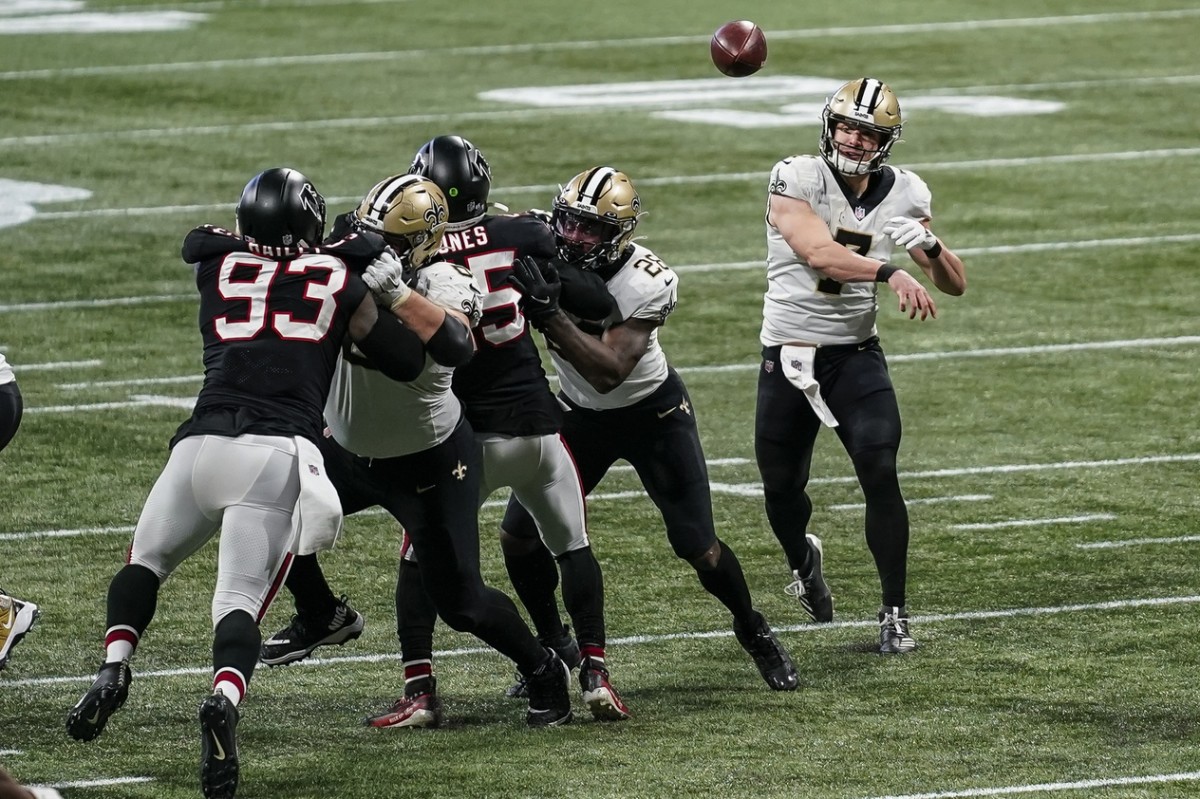 New Orleans Saints quarterback Taysom Hill (7) passes against the Atlanta Falcons. Mandatory Credit: Dale Zanine-USA TODAY Sports
