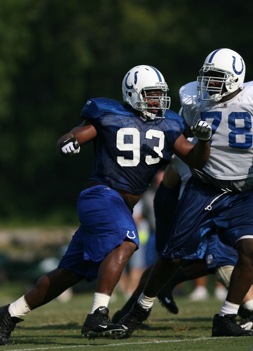 Aug 7, 2006; Terre Haute, IN, USA; Indianapolis Colts defensive end (93) Dwight Freeney rushes offensive tackle (78) Tarik Glenn during training camp at Rose-Hulman Institute of Technology in Terre Haute, Indiana. Mandatory Credit: Jason Parkhurst-USA TODAY Sports © 2006 Jason Parkhurst