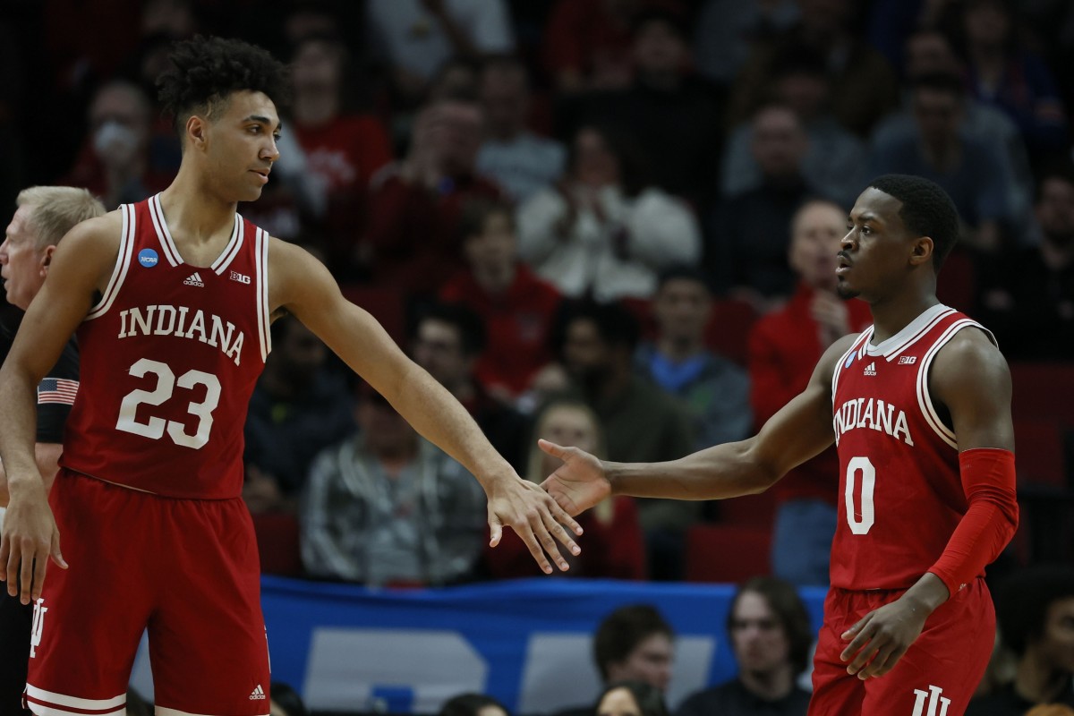 Indiana's Trayce Jackson-Davis (23) and Xavier Johnson celebrate during Indiana's NCAA Tournament run in 2022, the Hoosiers' first NCAA win since 2016. (USA TODAY Sports)