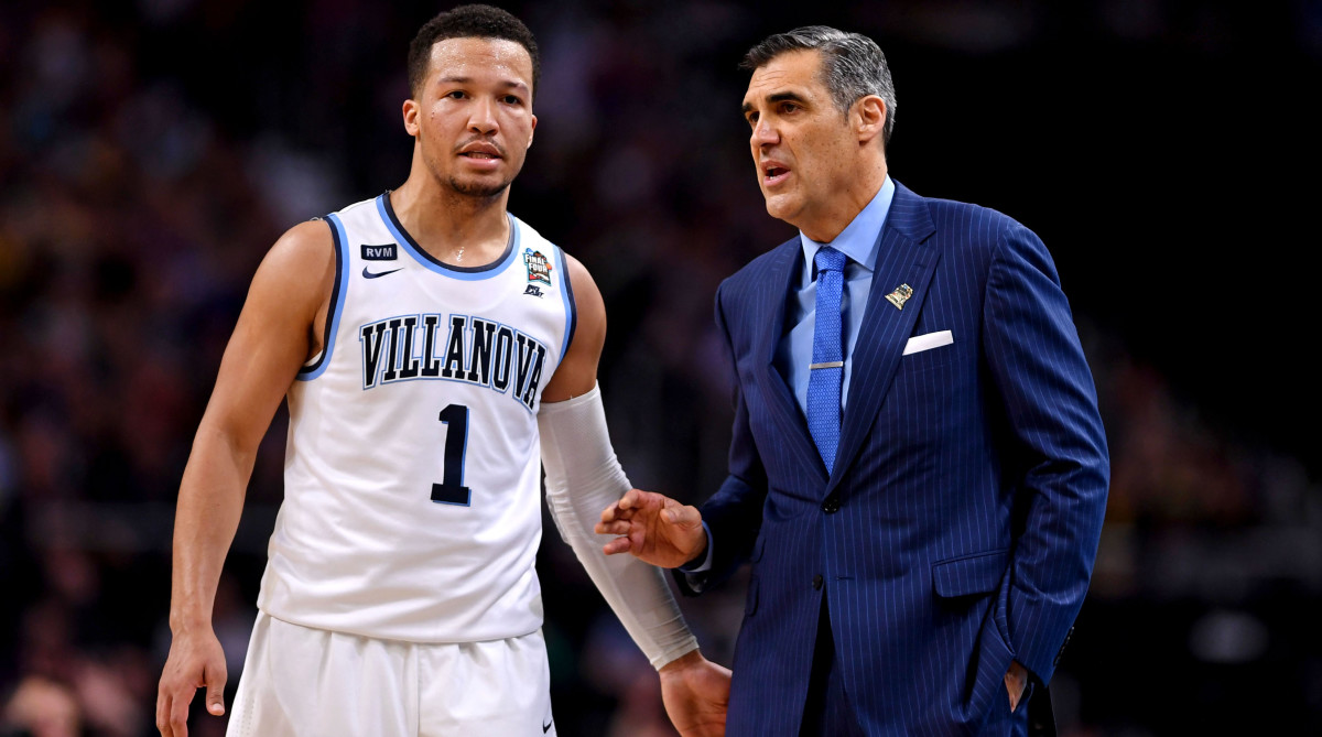 Villanova Wildcats guard Jalen Brunson (1) talks to Villanova Wildcats head coach Jay Wright during the first half against the Michigan Wolverines in the championship game of the 2018 men’s Final Four at Alamodome.