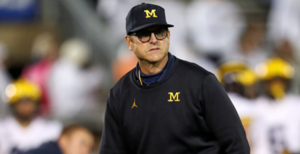 Michigan Wolverines head coach Jim Harbaugh on the sideline before a college football game in the Big Ten.