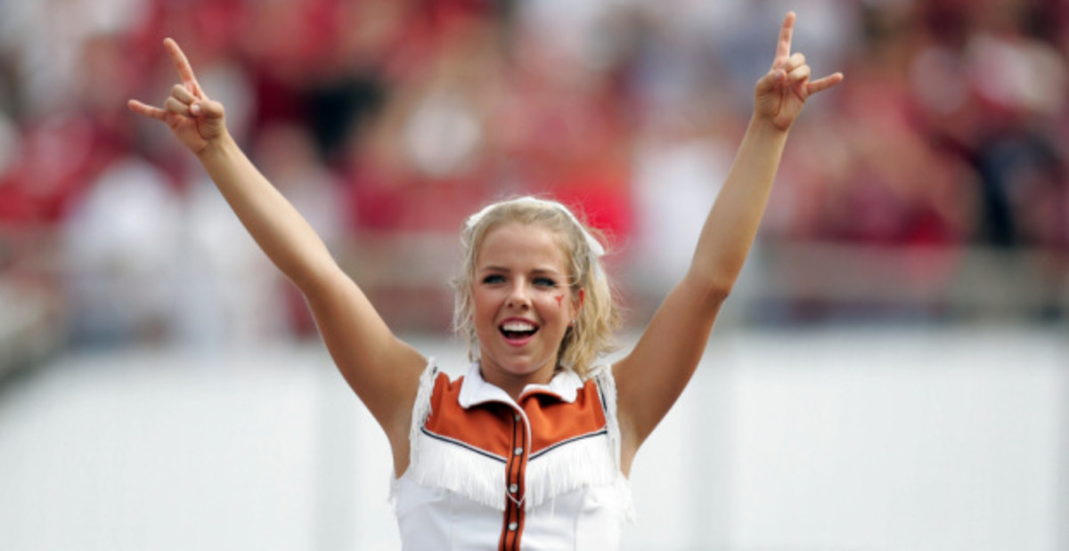 Texas football cheerleaders at a college football game in the Big 12.
