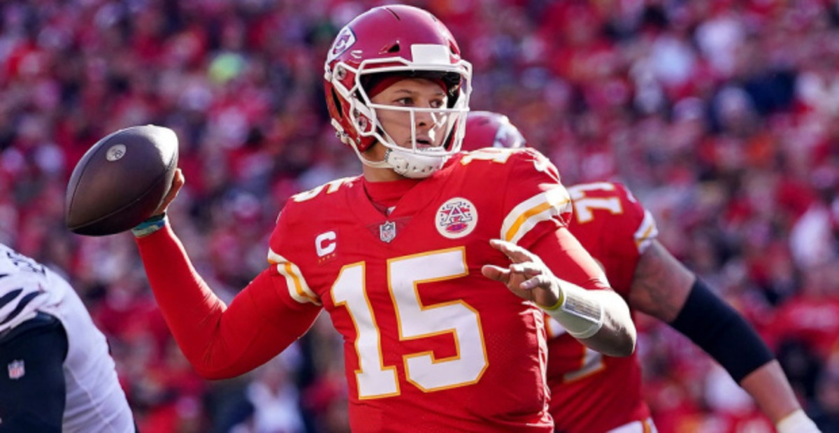 Kansas City Chiefs quarterback Patrick Mahomes attempts a pass during a game on the NFL schedule.