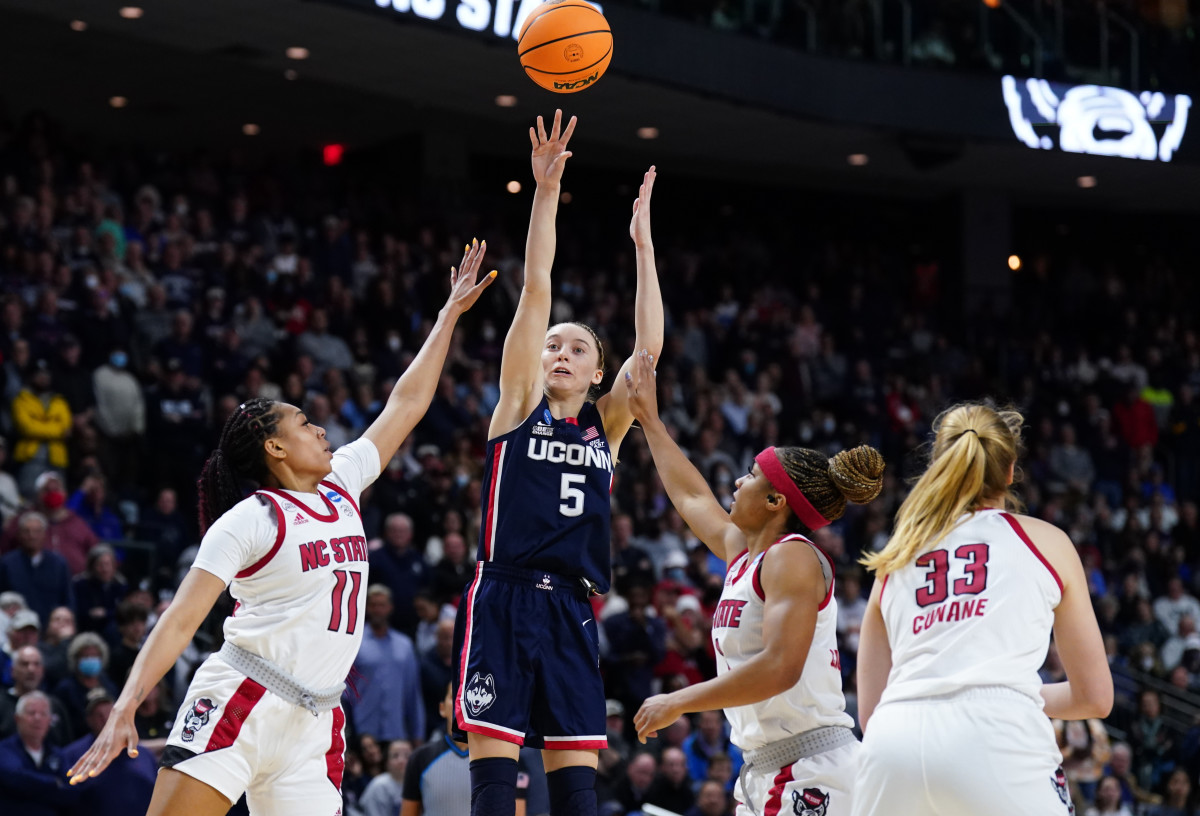 Mar 28, 2022; Bridgeport, CT, USA; UConn Huskies guard Paige Bueckers (5) shoots against the NC State Wolfpack during double overtime in the Bridgeport regional finals of the women's college basketball NCAA Tournament at Webster Bank Arena. Mandatory Credit: David Butler II-USA TODAY Sports