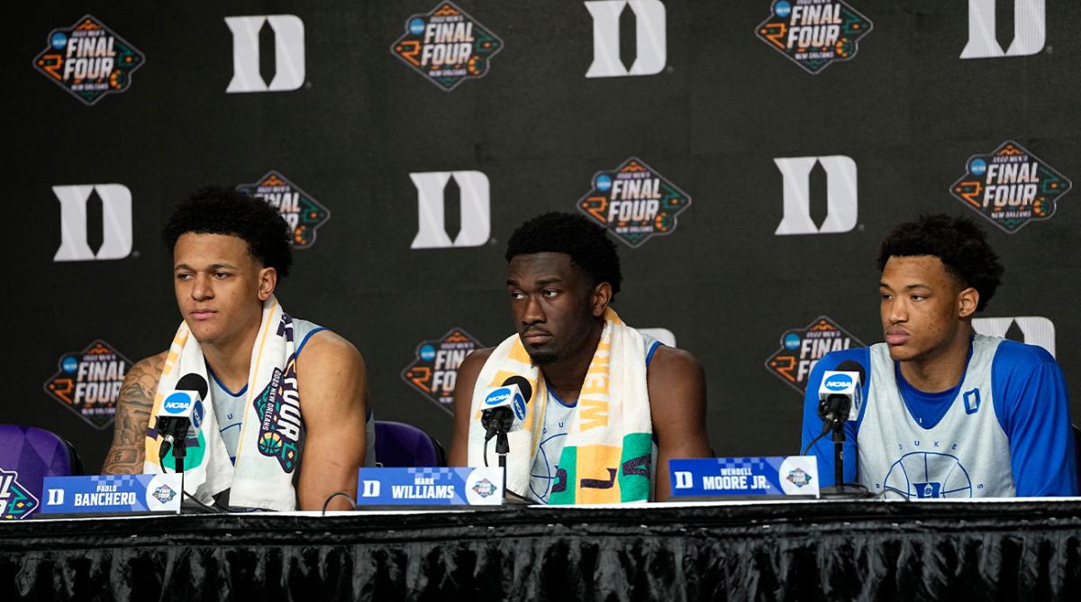 Duke’s Paolo Banchero, left, Mark Williams, center, and Wendell Moore Jr. listen to a question during a news conference at the men’s Final Four NCAA college basketball tournament Thursday, March 31, 2022, in New Orleans. North Carolina will play Duke Saturday.