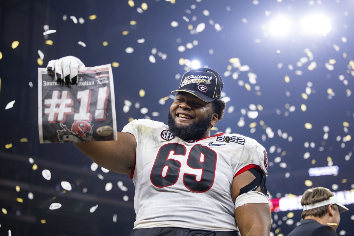 Jan 10, 2022; Indianapolis, IN, USA; Georgia Bulldogs offensive lineman Jamaree Salyer (69) celebrates after defeating the Alabama Crimson Tide in the 2022 CFP college football national championship game at Lucas Oil Stadium. Mandatory Credit: Mark J. Rebilas-USA TODAY Sports
