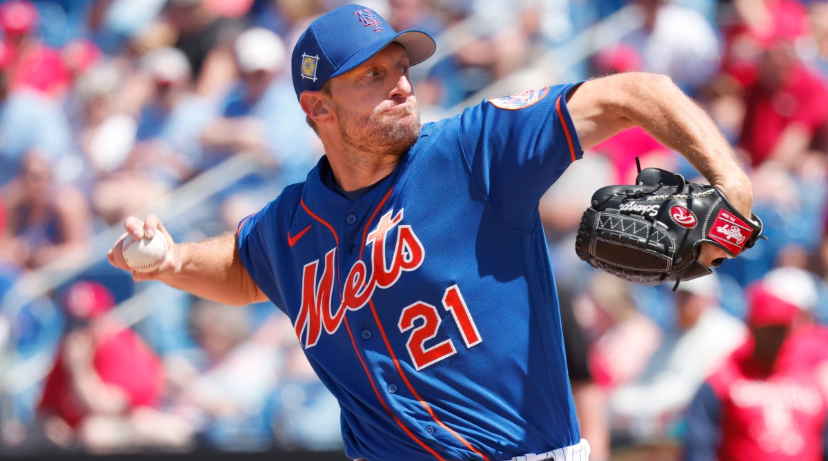 Max Scherzer throws a pitch during a spring training game.