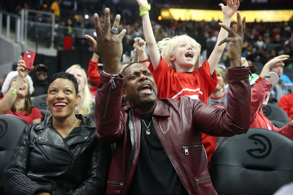 Dec 20, 2017; Atlanta, GA, USA; Entertainer and actor Chris Tucker reacts with Atlanta Hawks fans during the fourth quarter of the Hawks game against the Indiana Pacers at Philips Arena.