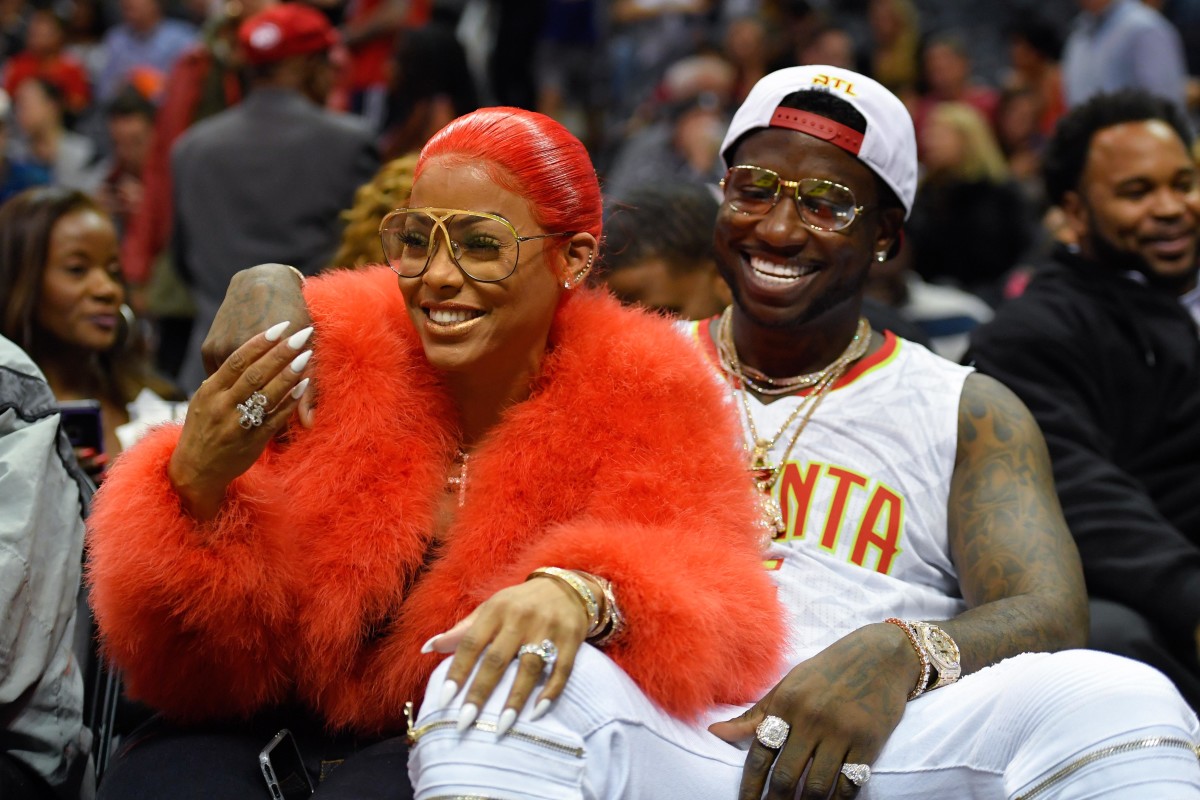 Nov 22, 2016; Atlanta, GA, USA; Recording artist Gucci Mane reacts with Keyshia Ka'oir after being engaged during a time out during the New Orleans Pelicans and Atlanta Hawks game during the second half at Philips Arena. The Pelicans defeated the Hawks 112-96.