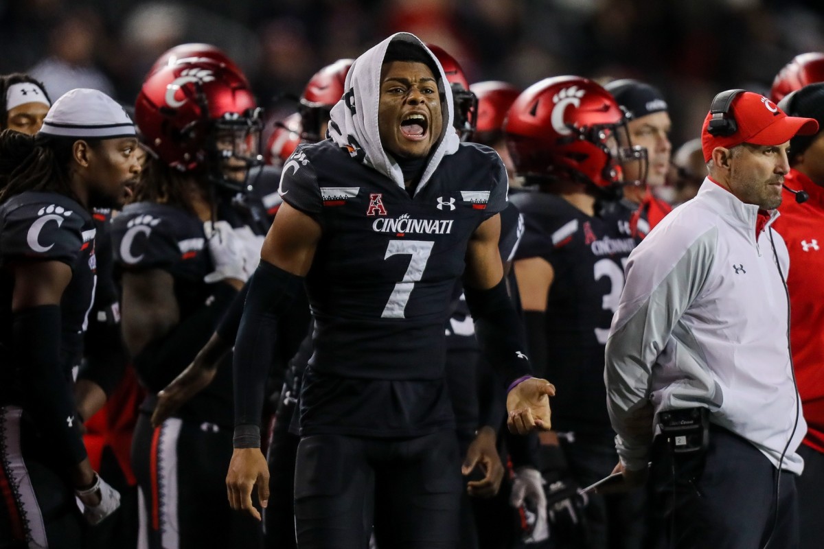 Nov 20, 2021; Cincinnati, Ohio, USA; Cincinnati Bearcats cornerback Coby Bryant (7) yells to his team during the second half of the game against the Southern Methodist Mustangs at Nippert Stadium. Mandatory Credit: Katie Stratman-USA TODAY Sports