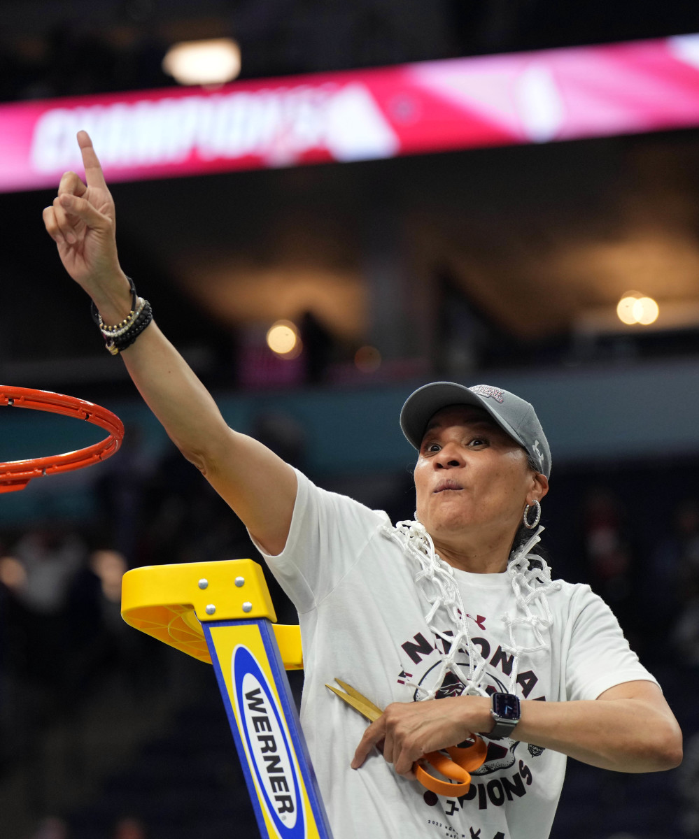 Apr 3, 2022; Minneapolis, MN, USA; South Carolina Gamecocks head coach Dawn Staley cuts down the net as they celebrate their 64-49 victory over the UConn Huskies in the Final Four championship game of the women's college basketball NCAA Tournament at Target Center.