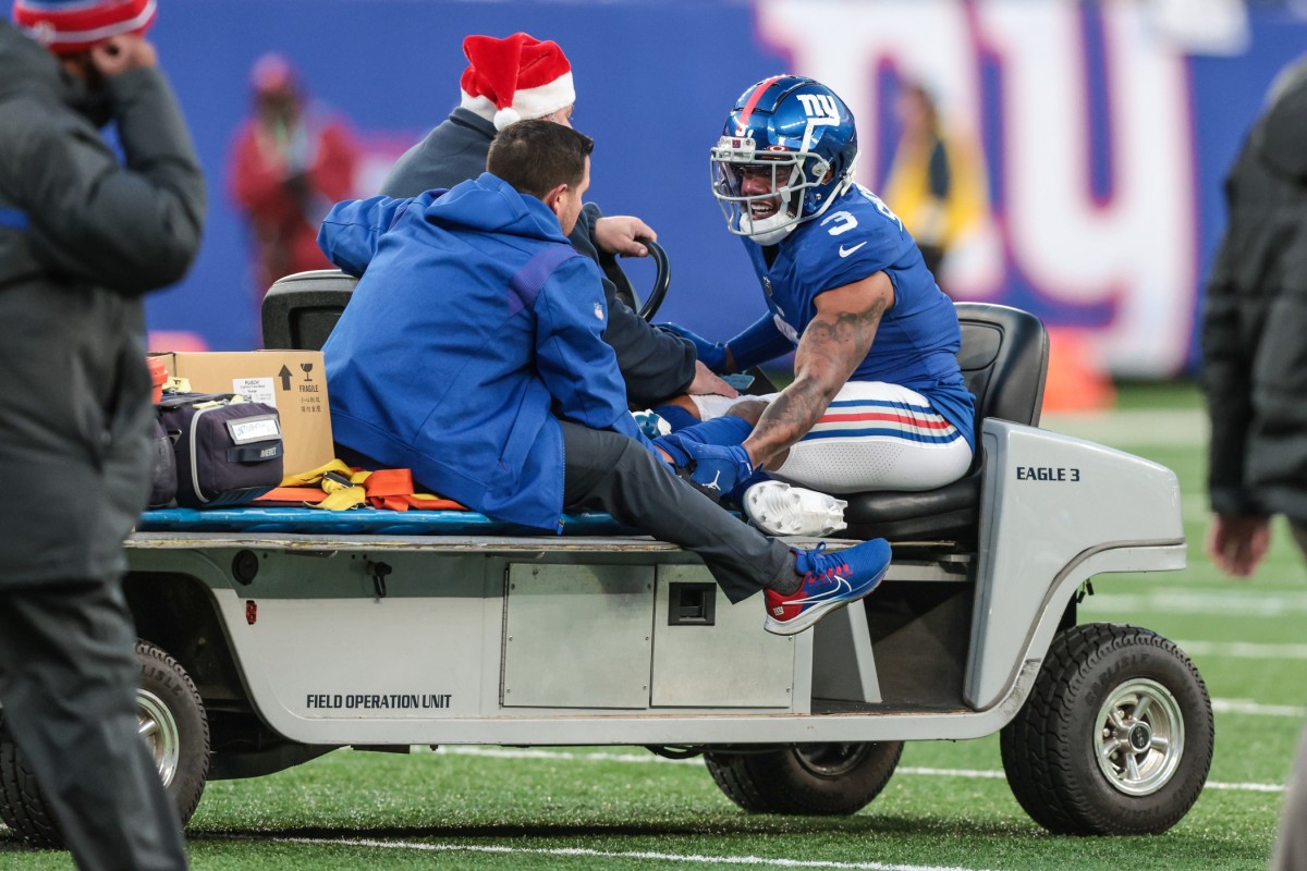 Dec 19, 2021; East Rutherford, New Jersey, USA; New York Giants wide receiver Sterling Shepard (3) is driven off of the field after an injury during the second half against the Dallas Cowboys at MetLife Stadium.