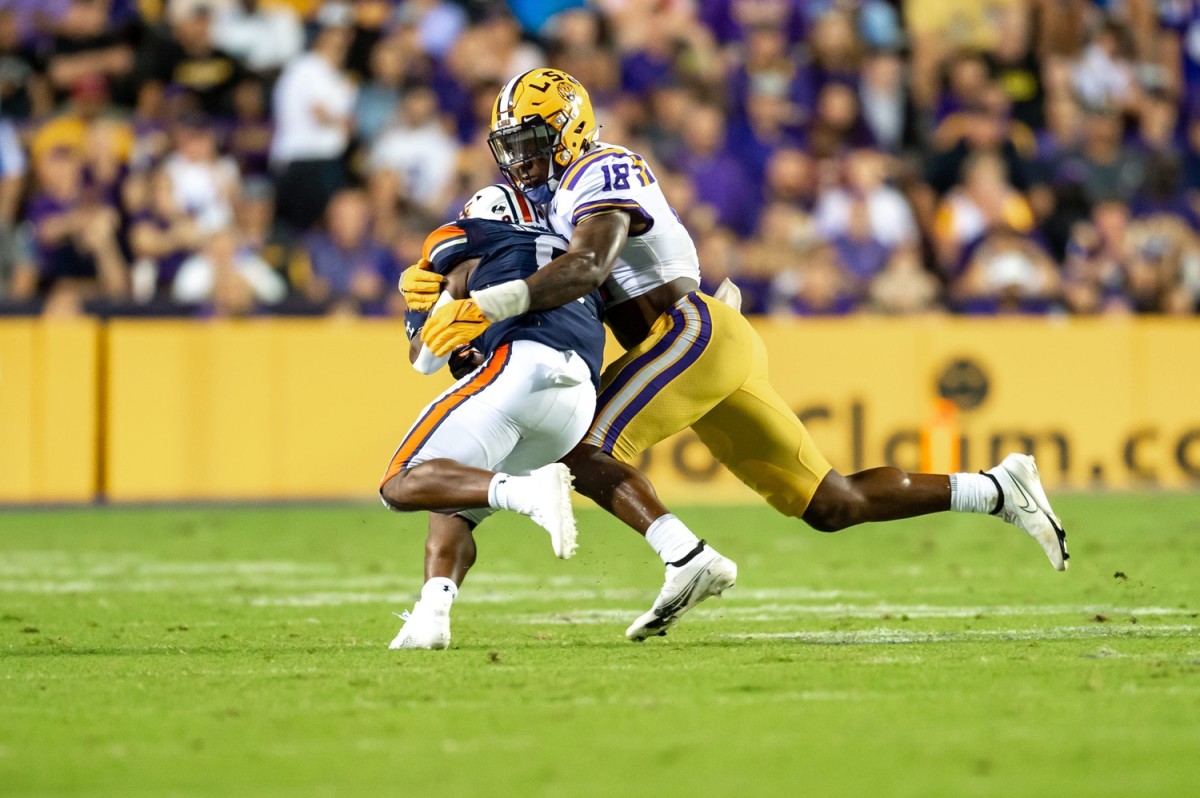 Damone Clark 18 makes a tackle as The LSU Tigers take on the Auburn Tigers in Tiger Stadium. Saturday, Oct. 2, 2021.