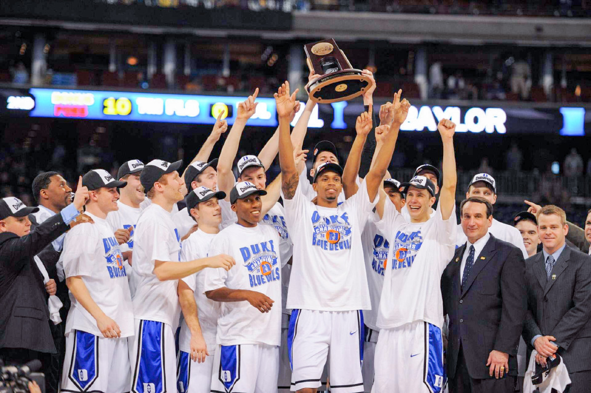 Scheyer (far right) helped deliver Coach K his fourth title, in 2010, against Butler.