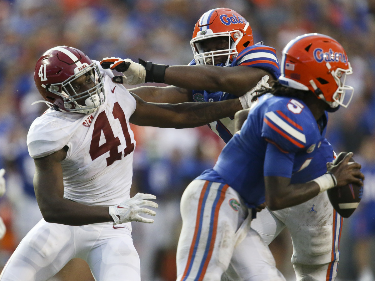 Alabama linebacker Chris Braswell (41) puts heavy pressure on Florida quarterback Emory Jones (5) on the final play of the game at Ben Hill Griffin Stadium. A