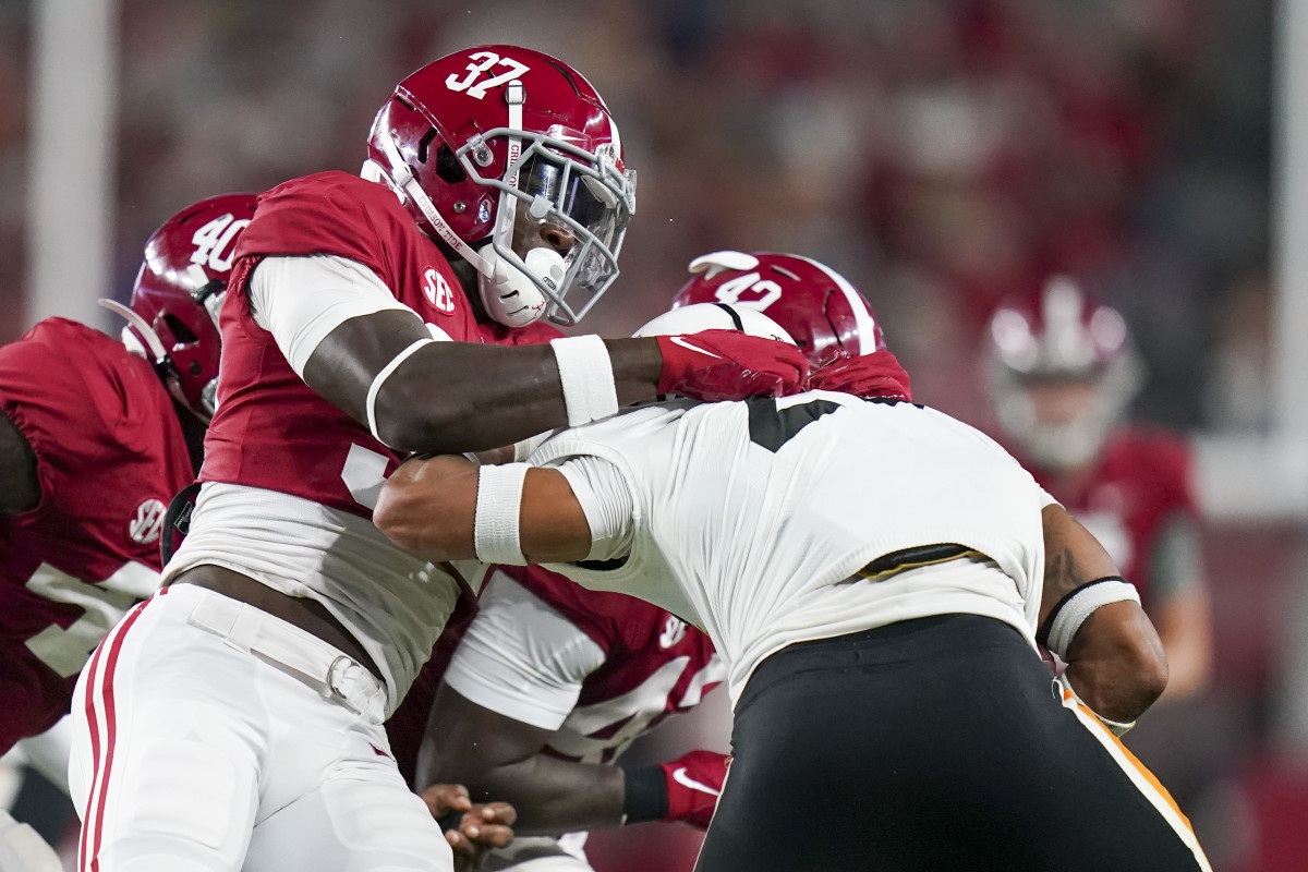 Alabama Crimson Tide linebacker Demouy Kennedy (37) tackles the Southern Miss Golden Eagles ball carrier at Bryant-Denny Stadium