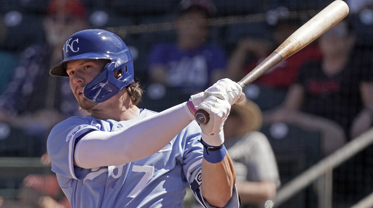Kansas City Royals' Bobby Witt Jr. watches his single during the third inning of a spring training baseball game against the Cincinnati Reds.