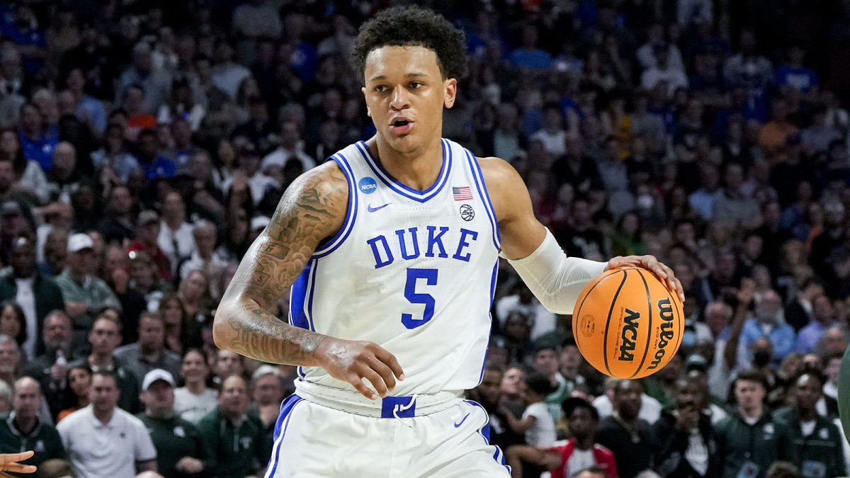 Duke Blue Devils forward Paolo Banchero (5) carries the ball against the Michigan State Spartans in the second half during the second round of the 2022 NCAA Tournament.