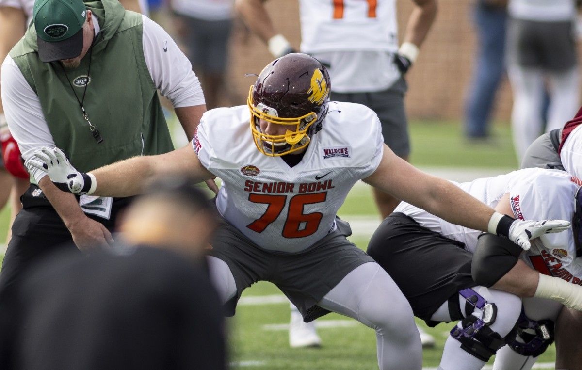 National offensive lineman Bernhard Raimann of Central Michigan (76) works with a coach during National practice for the 2022 Senior Bowl at Hancock Whitney Stadium.