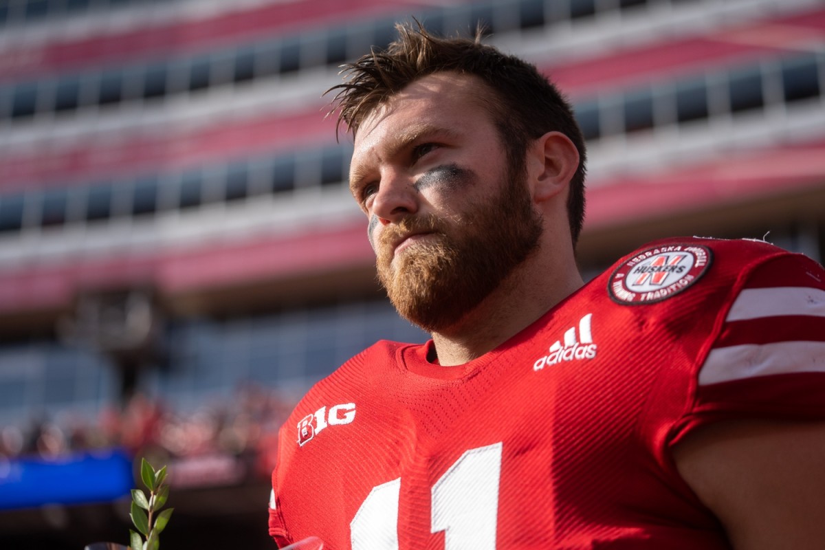 Nov 26, 2021; Lincoln, Nebraska, USA; Nebraska Cornhuskers tight end Austin Allen (11) walks onto the field during the Senior Day ceremony before the game against the Iowa Hawkeyes at Memorial Stadium.