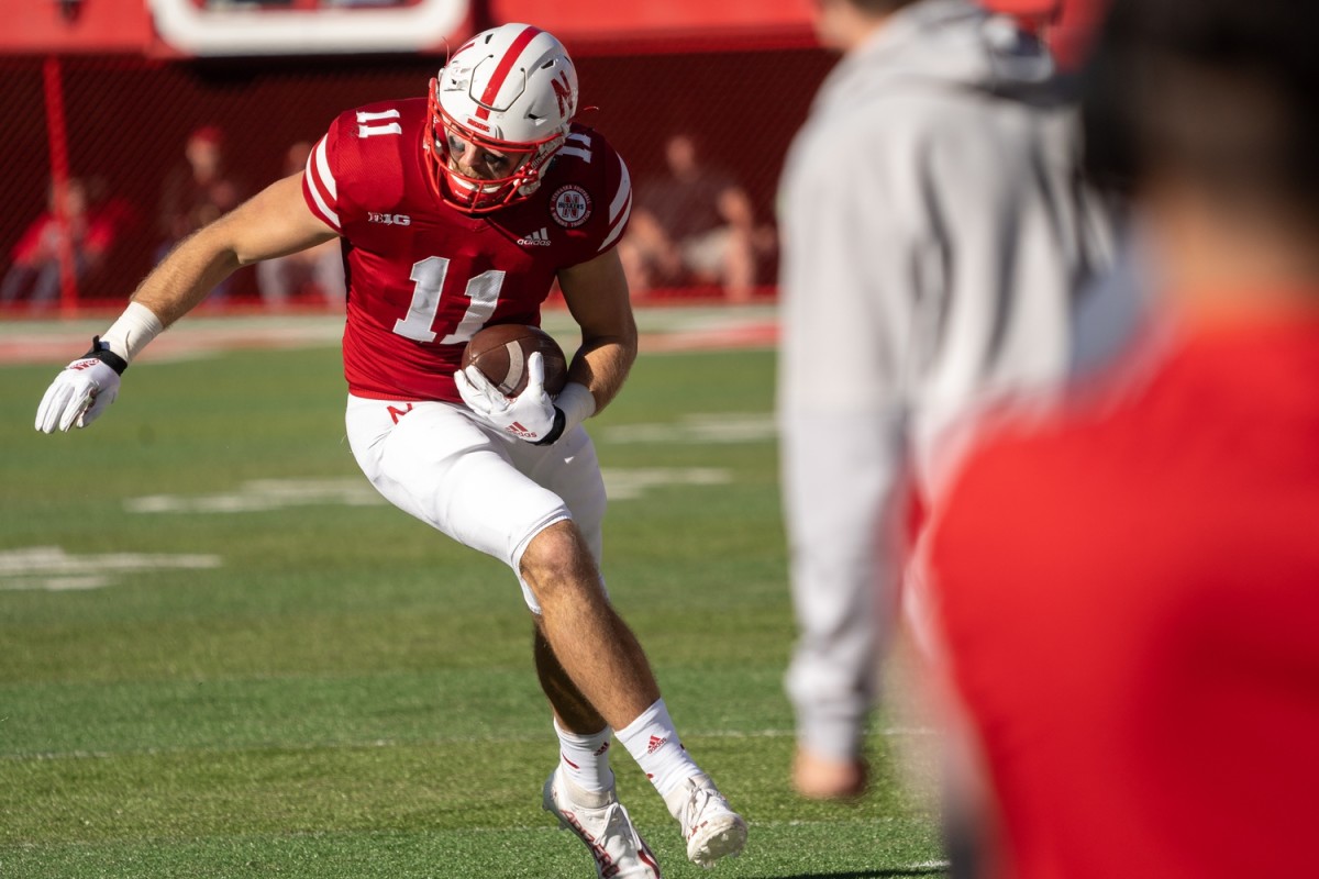 Oct 30, 2021; Lincoln, Nebraska, USA; Nebraska Cornhuskers tight end Austin Allen (11) runs with the ball after catching a pass from quarterback Adrian Martinez during the second quarter against the Purdue Boilermakers at Memorial Stadium.