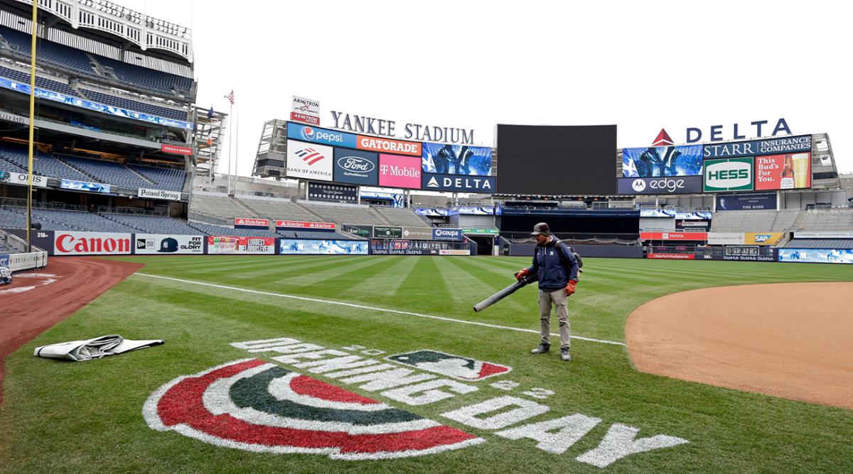 A member of the grounds crew prepares the field before the New York Yankees baseball workout on Thursday, April 7, 2022, in New York. The Yankees will face the Boston Red Sox on Friday.