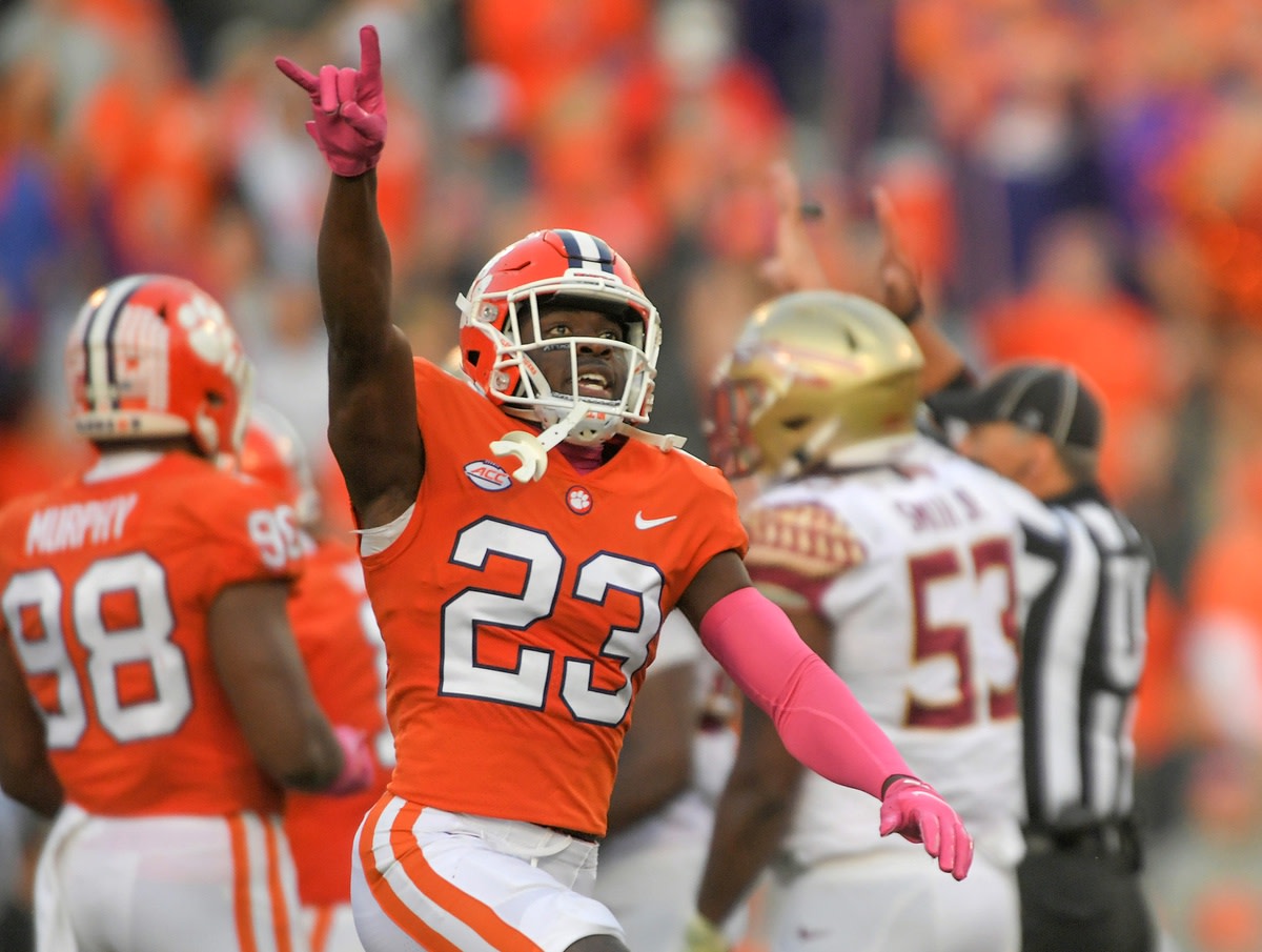 Oct 30, 2021; Clemson, South Carolina, USA; Clemson Tigers cornerback Andrew Booth Jr. (23) celebrates after a Clemson fumble recovery against the Florida State Seminoles during the fourth quarter at Memorial Stadium. Mandatory Credit: Ken Ruinard-USA TODAY Sports