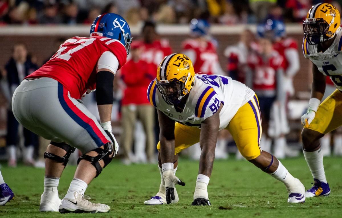 Nov 16, 2019; Oxford, MS, USA; Louisiana State Tigers defensive lineman Neil Farrell, Jr. (92) lines up against the Mississippi Rebels in the first half at Vaught-Hemingway Stadium.