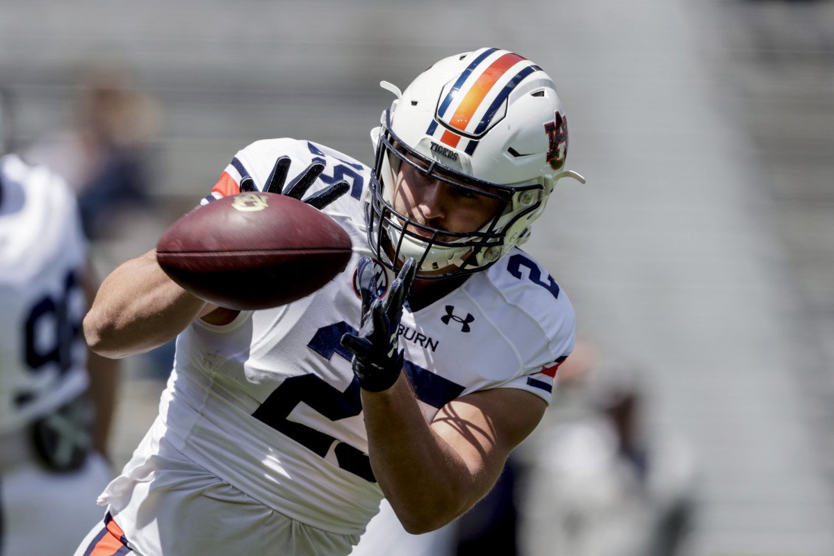 Auburn tight end John Samuel Shenker (25) catches a pass during warmups before the A-Day NCAA college spring football game at Jordan-Hare Stadium, Saturday, April 9, 2022, in Auburn, Ala. (AP Photo/Butch Dill)