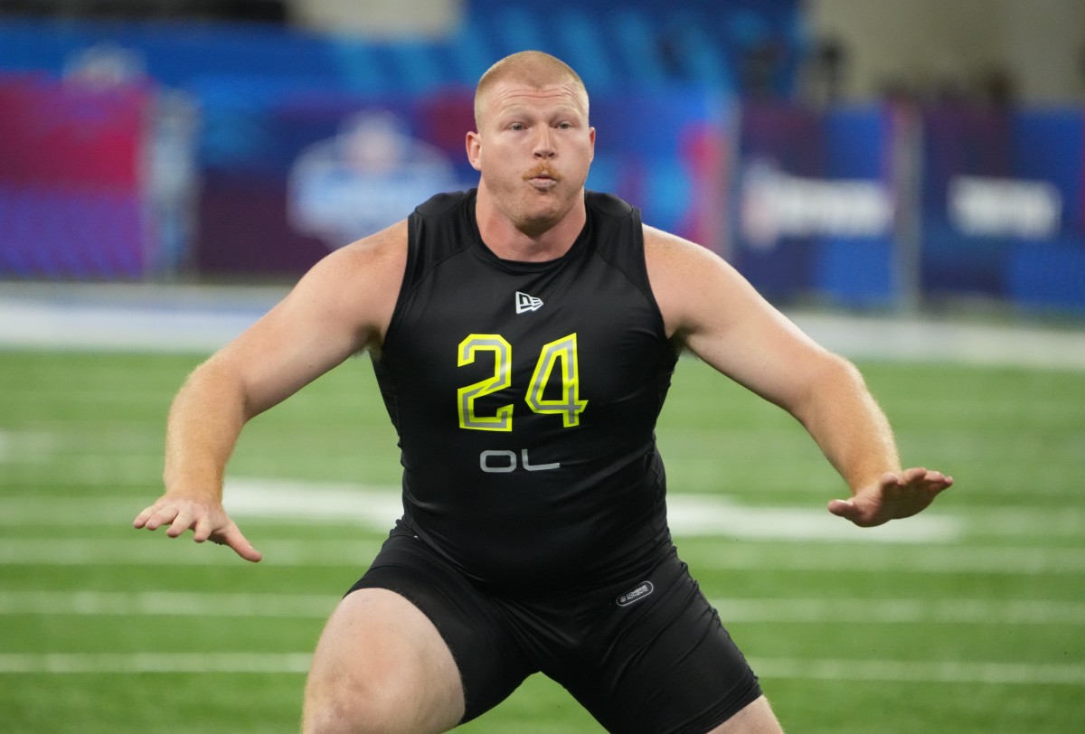 Mar 4, 2022; Indianapolis, IN, USA; Nebraska offensive lineman Cam Jurgens (OL24) goes through drills during the 2022 NFL Scouting Combine at Lucas Oil Stadium. Mandatory Credit: Kirby Lee-USA TODAY Sports