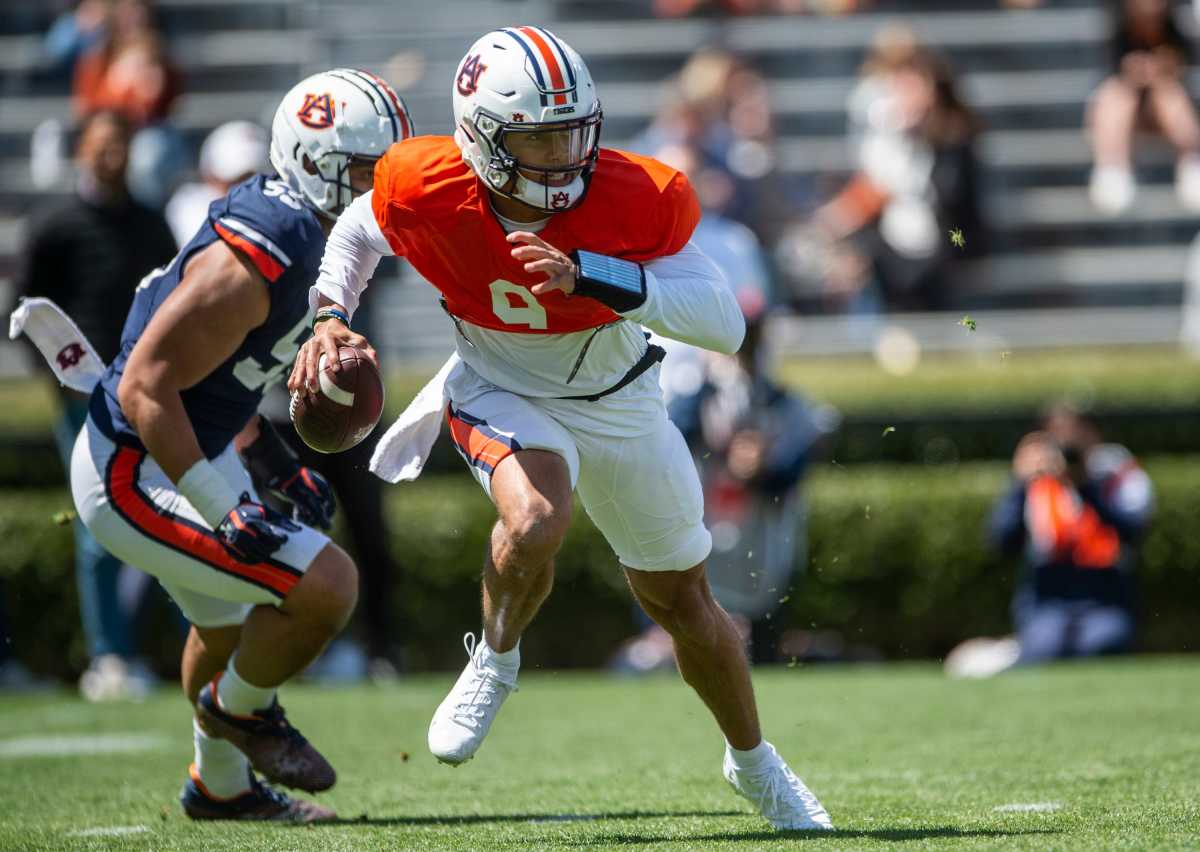 Auburn Tigers quarterback Robby Ashford (9) rolls out during the A-Day spring practice at Jordan-Hare Stadium in Auburn, Ala., on Saturday, April 9, 2022.