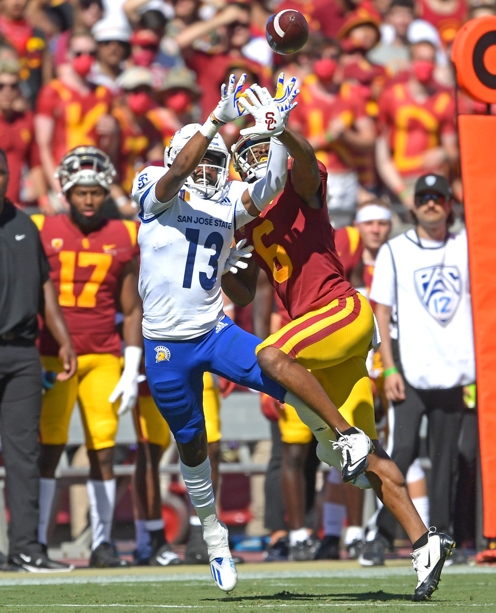 Sep 4, 2021; Los Angeles, California, USA; USC Trojans cornerback Isaac Taylor-Stuart (6) breaks up a pass intended for San Jose State Spartans wide receiver Jermaine Braddock (13) in the first half at United Airlines Field at Los Angeles Memorial Coliseum. Mandatory Credit: Jayne Kamin-Oncea-USA TODAY Sports